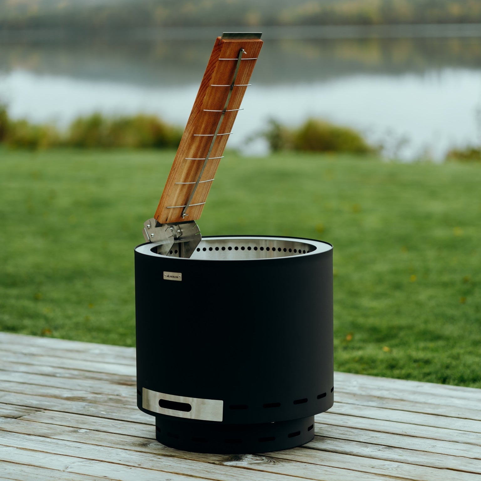 Flame salmon board for fire bowl