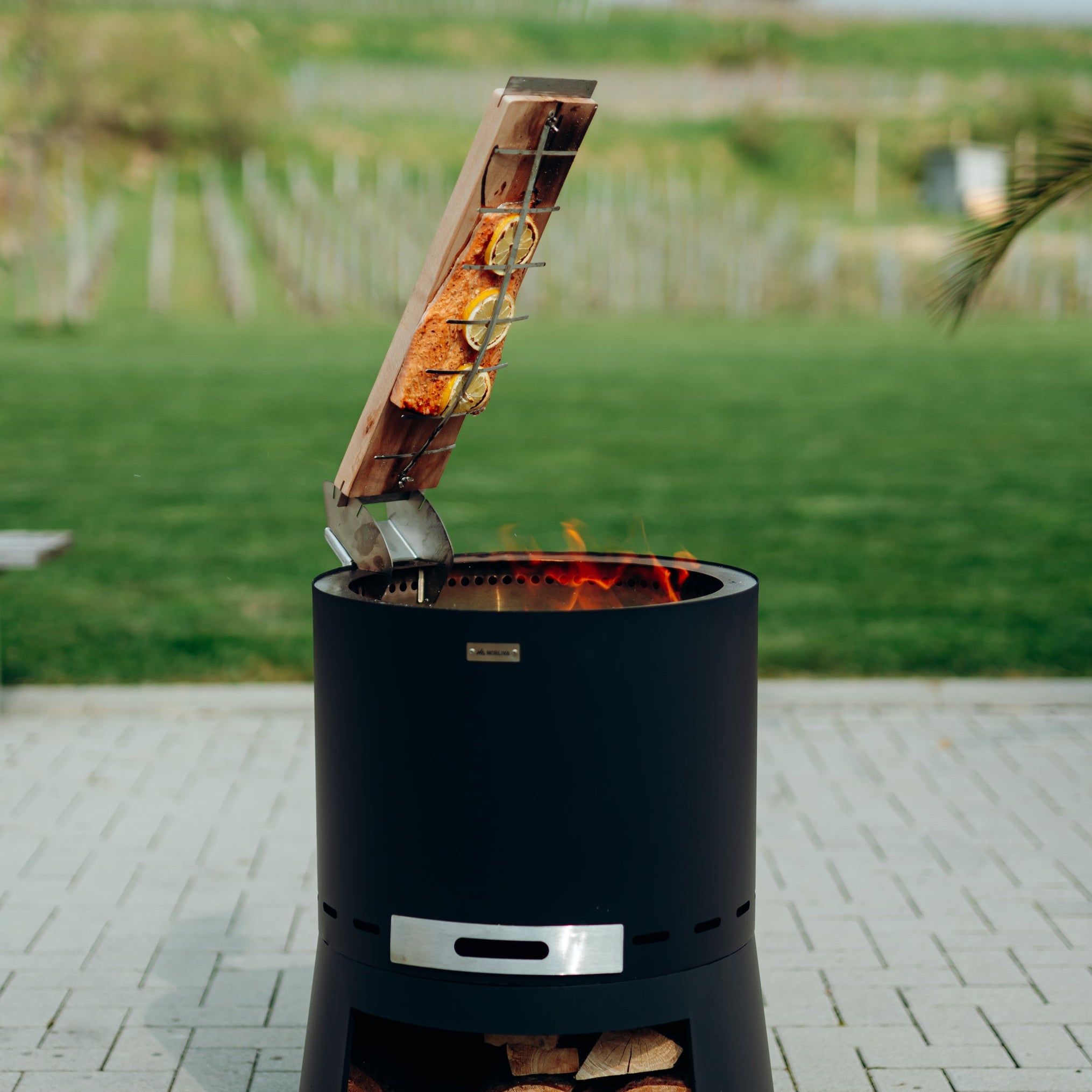 Flame salmon board for fire bowl